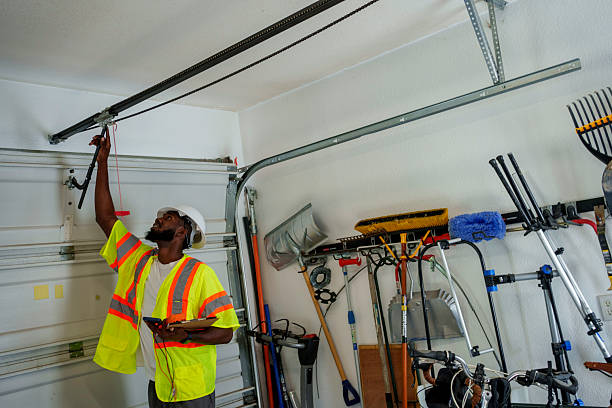 Professional Garage Door Panel Replacement technician working in Moosic, PA
